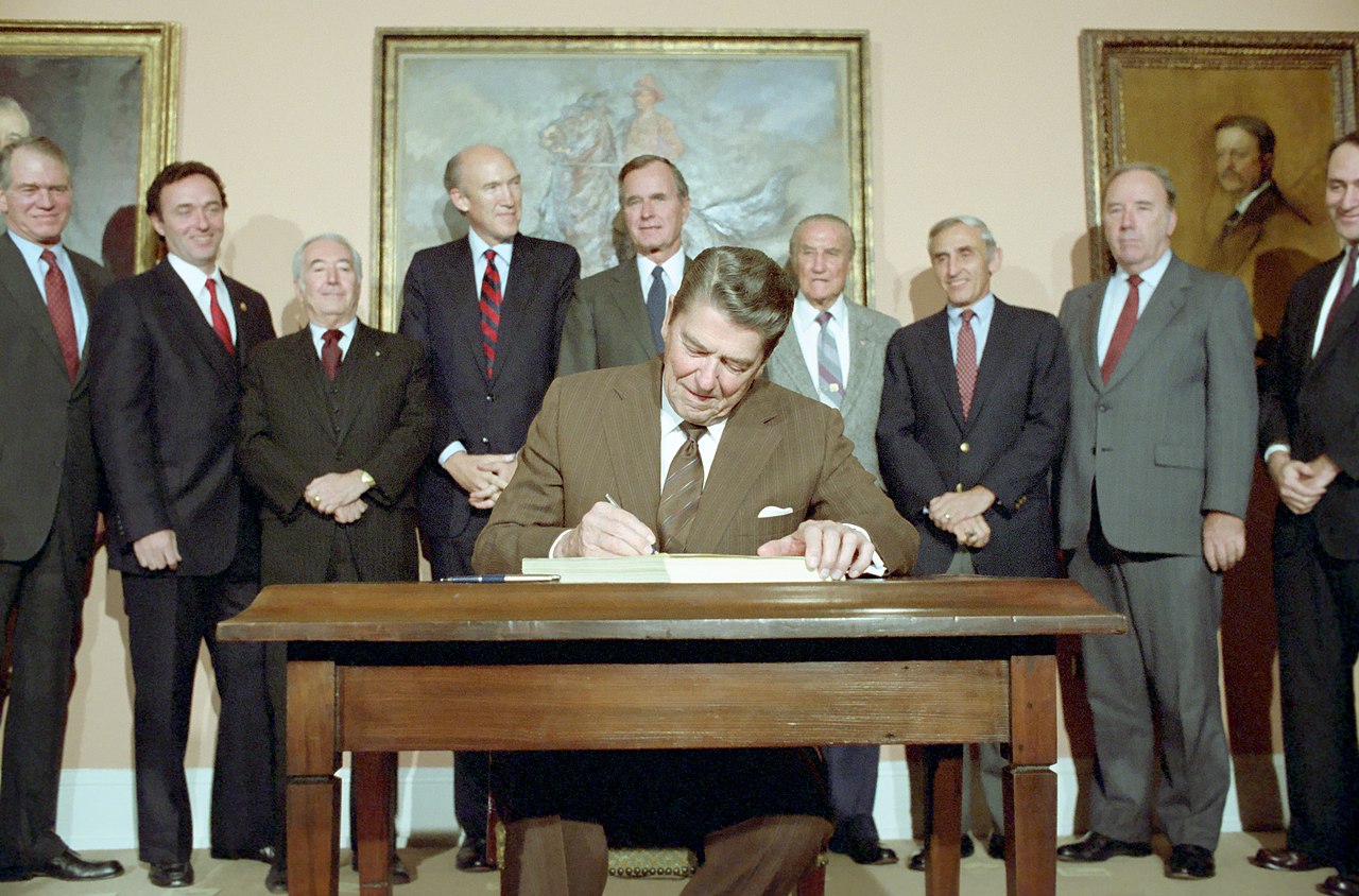 President Reagan signing the Immigration Reform and Control Act