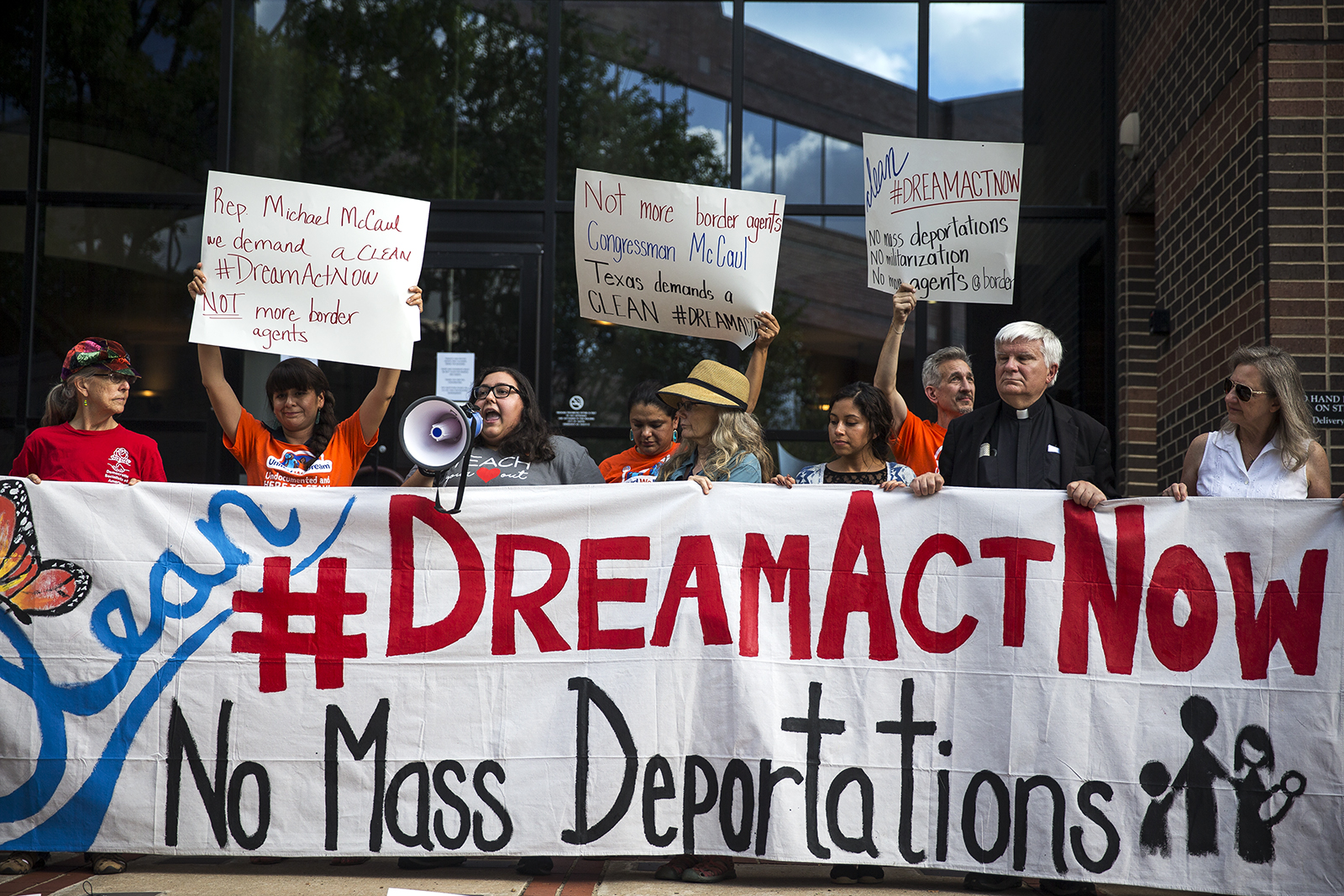 Supports of the Dream Act holding a Banner