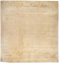 The document on permanent display in the Rotunda is the enrolled original Joint Resolution passed by Congress on September 25, 1789, proposing 12-not 10-amendments to the Constitution.