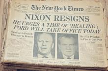 Newspaper with the headline "Nixon Resigns"