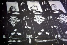 Tom McLaury, Frank McLaury and Billy Clanton (left to right) lie dead after the gunfight.